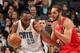 CHARLOTTE, NC - JANUARY 25: Al Jefferson #25 of the Charlotte Bobcats handles the ball against Joakim Noah #13 of the Chicago Bulls at the Time Warner Cable Arena on January 25, 2014 in Charlotte, North Carolina. NOTE TO USER: User expressly acknowledges