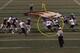 Harris breaks tackles on his way to open space.