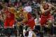 Dec 13, 2013; Milwaukee, WI, USA; Chicago Bulls guard D.J. Augustin (14) heads up court with the ball in front of guard Jimmy Butler (21) and center Joakim Noah (13) during the second quarter against the Milwaukee Bucks at BMO Harris Bradley Center. Manda