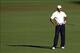 A look of disbelief from Tiger Woods after his approach shot hit the flagstick on 15 and caromed into the water in last year's Masters.