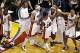 May 22, 2013; Miami, FL, USA; Miami Heat small forward LeBron James (6) is congratulated by teammates power forward Chris Andersen (11), small forward Shane Battier (31) and point guard Norris Cole (30) on his game winning shot to beat the Indiana Pacers