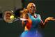 KEY BISCAYNE, FL - MARCH 25: Serena Willaims returns a shot to Angelique Kerber of Germany during their match on Day 9 of the Sony Open at Carndon Park Tennis Center on March 25, 2014 in Key Biscayne, Florida. (Photo by Mike Ehrmann/Getty Images)