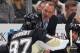 PITTSBURGH, PA - FEBRUARY 7: Head coach Dan Bylsma talks with Sidney Crosby #87 of the Pittsburgh Penguins during a timeout against the New York Rangers on February 7, 2014 at Consol Energy Center in Pittsburgh, Pennsylvania. (Photo by Gregory Shamus/NH