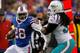ORCHARD PARK, NY - DECEMBER 22: C.J. Spiller #28 of the Buffalo Bills runsa against Dannell Ellerbe #59 of the Miami Dolphins at Ralph Wilson Stadium on December 22, 2013 in Orchard Park, New York. Buffalo won 16-0. (Photo by Rick Stewart/Getty Images)