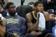 Feb 19, 2014; Minneapolis, MN, USA; Indiana Pacers center Roy Hibbert (55) and forward Paul George (24) react on the bench during the fourth quarter against the Minnesota Timberwolves at Target Center. The Timberwolves defeated the Pacers 104-91. Mandator