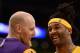 LOS ANGELES, CA - MARCH 25: Jordan Hill #27 of the Los Angeles Lakers and Chris Kaman #9 smile during a win over the New York Knicks at Staples Center on March 25, 2014 in Los Angeles, California. NOTE TO USER: User expressly acknowledges and agrees th