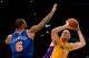 LOS ANGELES, CA - MARCH 25: Chris Kaman #9 of the Los Angeles Lakers shoots over Tyson Chandler #6 of the New York Knicks at Staples Center on March 25, 2014 in Los Angeles, California. NOTE TO USER: User expressly acknowledges and agrees that, by down