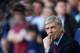 LONDON, ENGLAND - MARCH 16: Arsene Wenger manager of Arsenal looks on during the Barclays Premier League match between Tottenham Hotspur and Arsenal at White Hart Lane on March 16, 2014 in London, England. (Photo by Paul Gilham/Getty Images)