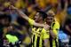 LONDON, ENGLAND - MAY 25: Ilkay Gundogan of Borussia Dortmund (L) celebrates with team-mate Marcel Schmelzer after scoring a goal from the penalty spot during the UEFA Champions League final match between Borussia Dortmund and FC Bayern Muenchen at Wembl
