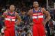 OAKLAND, CA - JANUARY 28: Bradley Beal #3 chats with teammate John Wall #2 of the Washington Wizards while facing the Golden State Warriors on January 28, 2014 at Oracle Arena in Oakland, California. NOTE TO USER: User expressly acknowledges and agrees th