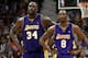 MINNEAPOLIS - MAY 29: Shaquille O'Neal #34 and Kobe Bryant #8 of the Los Angeles Lakers stand on the court while playing againt the Minnesota Timberwolves in Game Five of the Western Conference Finals during the 2004 NBA Playoffs on May 29, 2004 at Targe