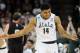 SPOKANE, WA - MARCH 22: Gary Harris #14 of the Michigan State Spartans celebrates a three-point shot in the second half against the Harvard Crimson during the Third Round of the 2014 NCAA Basketball Tournament at Spokane Veterans Memorial Arena on March