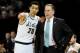 SPOKANE, WA - MARCH 22: Head coach Tom Izzo and Travis Trice #20 of the Michigan State Spartans talk in the second half against the Harvard Crimson during the Third Round of the 2014 NCAA Basketball Tournament at Spokane Veterans Memorial Arena on March