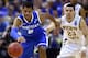 ST LOUIS, MO - MARCH 23: Andrew Harrison #5 of the Kentucky Wildcats drives up the court against Fred VanVleet #23 of the Wichita State Shockers during the third round of the 2014 NCAA Men's Basketball Tournament at Scottrade Center on March 23, 2014 in S