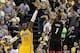 Mar 26, 2014; Indianapolis, IN, USA; Miami Heat center Chris Bosh (1) takes the final shot of the game with Indiana Pacers center Roy Hibbert (55) defending during the fourth quarter at Bankers Life Fieldhouse. The Pacers won 84-83. Mandatory Credit: Pat