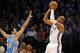 Mar 24, 2014; Oklahoma City, OK, USA; Oklahoma City Thunder forward Caron Butler (2) attempts a shot against Denver Nuggets guard Evan Fournier (94) during the third quarter at Chesapeake Energy Arena. Mandatory Credit: Mark D. Smith-USA TODAY Sports