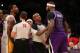 LOS ANGELES, CA - NOVEMBER 24: DeMarcus Cousins #15 of the Sacramento Kings and Shawne Williams #3 of the Los Angeles Lakers exchange words during an altercation in the game at Staples Center on November 24, 2013 in Los Angeles, California. The Lakers wo