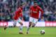 WEST BROMWICH, ENGLAND - MARCH 08: Robin van Persie and Juan Mata of Manchester United in action during the Barclays Premier League match between West Bromwich Albion and Manchester United at The Hawthorns on March 8, 2014 in West Bromwich, England. (Ph
