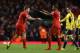 LIVERPOOL, ENGLAND - MARCH 26: Steven Gerrard of Liverpool celebrates with team-mate Glen Johnson (R) at the end of the Barclays Premier League match between Liverpool and Sunderland at Anfield on March 26, 2014 in Liverpool, England. (Photo by Alex Liv