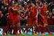 LIVERPOOL, ENGLAND - MARCH 26: Steven Gerrard of Liverpool celebrates scoring the first goal with his team-mates during the Barclays Premier League match between Liverpool and Sunderland at Anfield on March 26, 2014 in Liverpool, England. (Photo by Alex