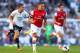 LONDON, ENGLAND - MARCH 16: Alex Oxlade-Chamberlain of Arsenal breaks with the ball during the Barclays Premier League match between Tottenham Hotspur and Arsenal at White Hart Lane on March 16, 2014 in London, England. (Photo by Paul Gilham/Getty Image