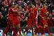 LIVERPOOL, ENGLAND - MARCH 26: Steven Gerrard of Liverpool celebrates scoring the first goal with his team-mates during the Barclays Premier League match between Liverpool and Sunderland at Anfield on March 26, 2014 in Liverpool, England. (Photo by Alex