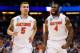 ORLANDO, FL - MARCH 22: Scottie Wilbekin #5 and Patric Young #4 of the Florida Gators celebrate after Wilbekin makes a three-pointer to end the first half against the Pittsburgh Panthers during the third round of the 2014 NCAA Men's Basketball Tournament