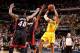 INDIANAPOLIS, IN - MARCH 26: David West #21 of the Indiana Pacers shoots against Chris Bosh #1 of the Miami Heat during a game on March 26, 2014 at Bankers Life Fieldhouse in Indianapolis, IN. NOTE TO USER: User expressly acknowledges and agrees that, by