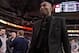 Jan 7, 2014; Dallas, TX, USA; Los Angeles Lakers shooting guard Kobe Bryant (24) comes off the court after the game against the Dallas Mavericks at the American Airlines Center. The Mavericks defeated the Lakers 110-97. Mandatory Credit: Jerome Miron-USA