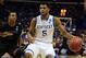 Mar 21, 2014; St. Louis, MO, USA; Kentucky Wildcats guard Andrew Harrison (5) dribbles past Kansas State Wildcats guard Marcus Foster (2) in the second half during the 2nd round of the 2014 NCAA Men's Basketball Championship at Scottrade Center. Mandatory