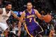 DENVER, CO - March 7: Xavier Henry #7 of the Los Angeles Lakers handles the ball against the Denver Nuggets on March 7, 2014 at the Pepsi Center in Denver, Colorado. NOTE TO USER: User expressly acknowledges and agrees that, by downloading and/or using th
