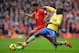 LIVERPOOL, ENGLAND - FEBRUARY 08: Raheem Sterling of Liverpool is challenged by Bacary Sagna of Arsenal during the Barclays Premier League match between Liverpool and Arsenal at Anfield on February 8, 2014 in Liverpool, England. (Photo by Michael Regan/