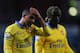 LONDON, ENGLAND - DECEMBER 26: Theo Walcott (L) and Bacary Sagna of Arsenal look on after the Barclays Premier League match between West Ham United and Arsenal at Boleyn Ground on December 26, 2013 in London, England. (Photo by Ian Walton/Getty Images)