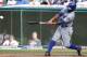 CLEVELAND, OH - SEPTEMBER 8: Eric Young #22 of the New York Mets hits an RBI double to score teammate Matt den Dekker #6 during the ninth inning against the Cleveland Indians in their game on September 8, 2013 at Progressive Field in Cleveland, Ohio. Th