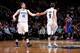 MINNEAPOLIS, MN - MARCH 7: Kevin Love #42 and Ricky Rubio #9 of the Minnesota Timberwolves celebrate during a game against the Detroit Pistons on March 7, 2014 at Target Center in Minneapolis, Minnesota. NOTE TO USER: User expressly acknowledges and agree
