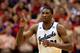 LAWRENCE, KS - JANUARY 18: Joel Embiid #21 of the Kansas Jayhawks reacts after scoring during the game against the Oklahoma State Cowboys at Allen Fieldhouse on January 18, 2014 in Lawrence, Kansas. (Photo by Jamie Squire/Getty Images)