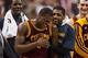 Feb 18, 2014; Philadelphia, PA, USA; Cleveland Cavaliers guard Dion Waiters (3) talks with teammates as he walks off the floor after being injured during the second quarter against the Philadelphia 76ers at the Wells Fargo Center. Mandatory Credit: Howard