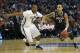 Mar 22, 2014; Buffalo, NY, USA; Connecticut Huskies guard Shabazz Napier (13) drives past Villanova Wildcats guard Tony Chennault (5) in the first half of a men's college basketball game during the third round of the 2014 NCAA Tournament at First Niagara