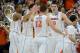 Mar 23, 2014; Raleigh, NC, USA; Virginia Cavaliers forward/center Mike Tobey (10) celebrates with guard Joe Harris (12) against the Memphis Tigers during the first half of a men's college basketball game during the third round of the 2014 NCAA Tournament