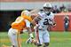 Nov 9, 2013; Knoxville, TN, USA; Auburn Tigers running back Corey Grant (20) rushes against Tennessee Volunteers defensive back Cameron Sutton (23) during the second half at Neyland Stadium. Auburn won 55-23. Mandatory Credit: Jim Brown-USA TODAY Sports