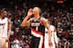 MIAMI, FL - MARCH 24: Damian Lillard #0 of the Portland Trail Blazers celebrates during the game against the Miami Heat on March 24, 2014 at American Airlines Arena in Miami, Florida. NOTE TO USER: User expressly acknowledges and agrees that, by downloa