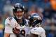 HOUSTON, TX - DECEMBER 22: Peyton Manning #18 of the Denver Broncos celebrates with Montee Ball #28 after Manning set the NFL record for touchdown passes in a season with 51, in a 37-13 defeat of the Houston Texans at Reliant Stadium on December 22, 2013