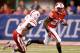 INDIANAPOLIS, IN - DECEMBER 01: Montee Ball #28 of the Wisconsin Badgers tries to get around the tackle of Andrew Green #11 of the Nebraska Cornhuskers during a second quarter run during the Big 10 Conference Championship Game at Lucas Oil Stadium on Dece