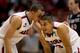 ANAHEIM, CA - MARCH 27: Gabe York #1 talks with Nick Johnson #13 of the Arizona Wildcats in the second half while taking on the San Diego State Aztecs during the regional semifinal of the 2014 NCAA Men's Basketball Tournament at the Honda Center on March