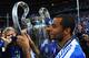 MUNICH, GERMANY - MAY 19: Ashley Cole of Chelsea celebrates with the trophy after their victory in the UEFA Champions League Final between FC Bayern Muenchen and Chelsea at the Fussball Arena München on May 19, 2012 in Munich, Germany. (Photo by Mike He