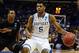 Mar 21, 2014; St. Louis, MO, USA; Kentucky Wildcats guard Andrew Harrison (5) dribbles past Kansas State Wildcats guard Marcus Foster (2) in the second half during the 2nd round of the 2014 NCAA Men's Basketball Championship at Scottrade Center. Mandatory