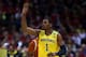 MILWAUKEE, WI - MARCH 22: Glenn Robinson III #1 of the Michigan Wolverines celebrates a three point shot in the second half against the Texas Longhorns during the third round of the 2014 NCAA Men's Basketball Tournament at BMO Harris Bradley Center on Ma