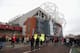 MANCHESTER, ENGLAND - MARCH 16: Fans make their way to the stadium prior to the Barclays Premier League match between Manchester United and Liverpool at Old Trafford on March 16, 2014 in Manchester, England. (Photo by Alex Livesey/Getty Images)
