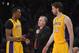 Apr 17, 2013; Los Angeles, CA, USA; Los Angeles Lakers coach Mike D'Antoni (center) talks with center Dwight Howard (12) and forward Pau Gasol (16) during the game against the Houston Rockets at the Staples Center. The Lakers defeated the Rockets 99-95 in