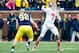 Oct 19, 2013; Ann Arbor, MI, USA; Indiana Hoosiers quarterback Nate Sudfeld (7) throws the ball as Michigan Wolverines defensive end Keith Heitzman (92) goes to tackle in the first quarter at Michigan Stadium. Mandatory Credit: Rick Osentoski-USA TODAY Sp